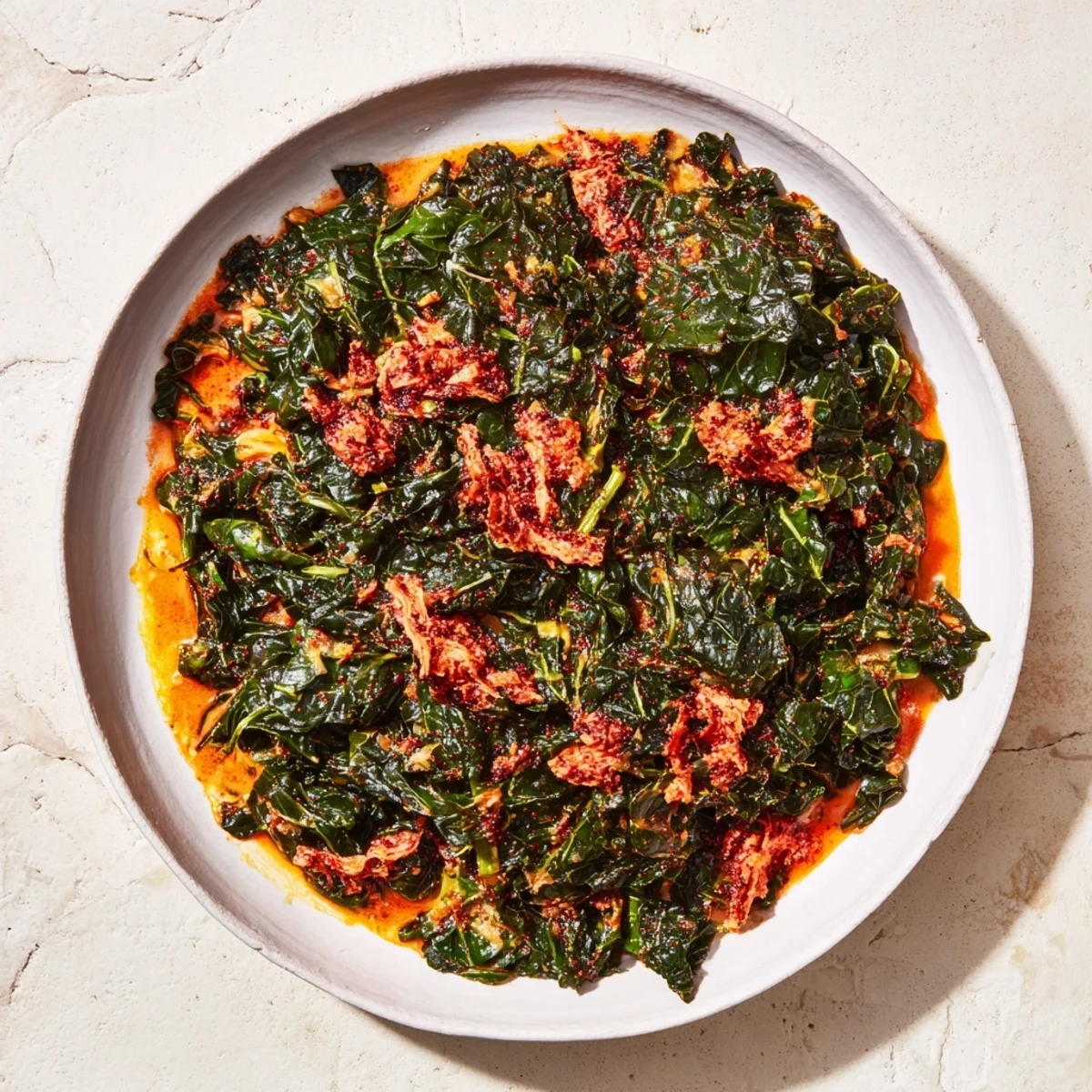 Steaming Cheesy Southern Collard Greens with Smoked Turkey, a savory side dish ready to be served.