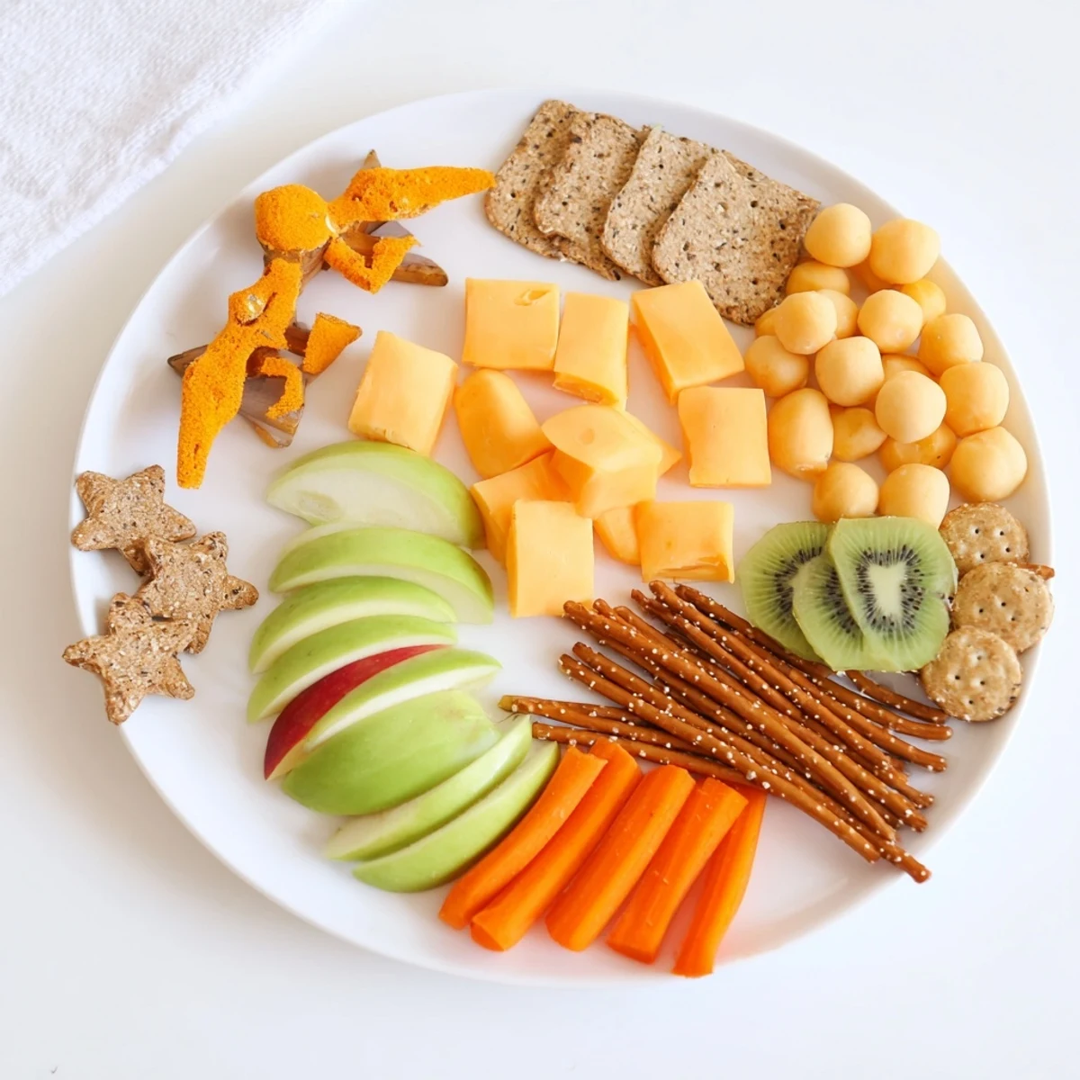 Get ready for a fun meal! A vibrant Spaceship Launch Snack Board filled with healthy choices.