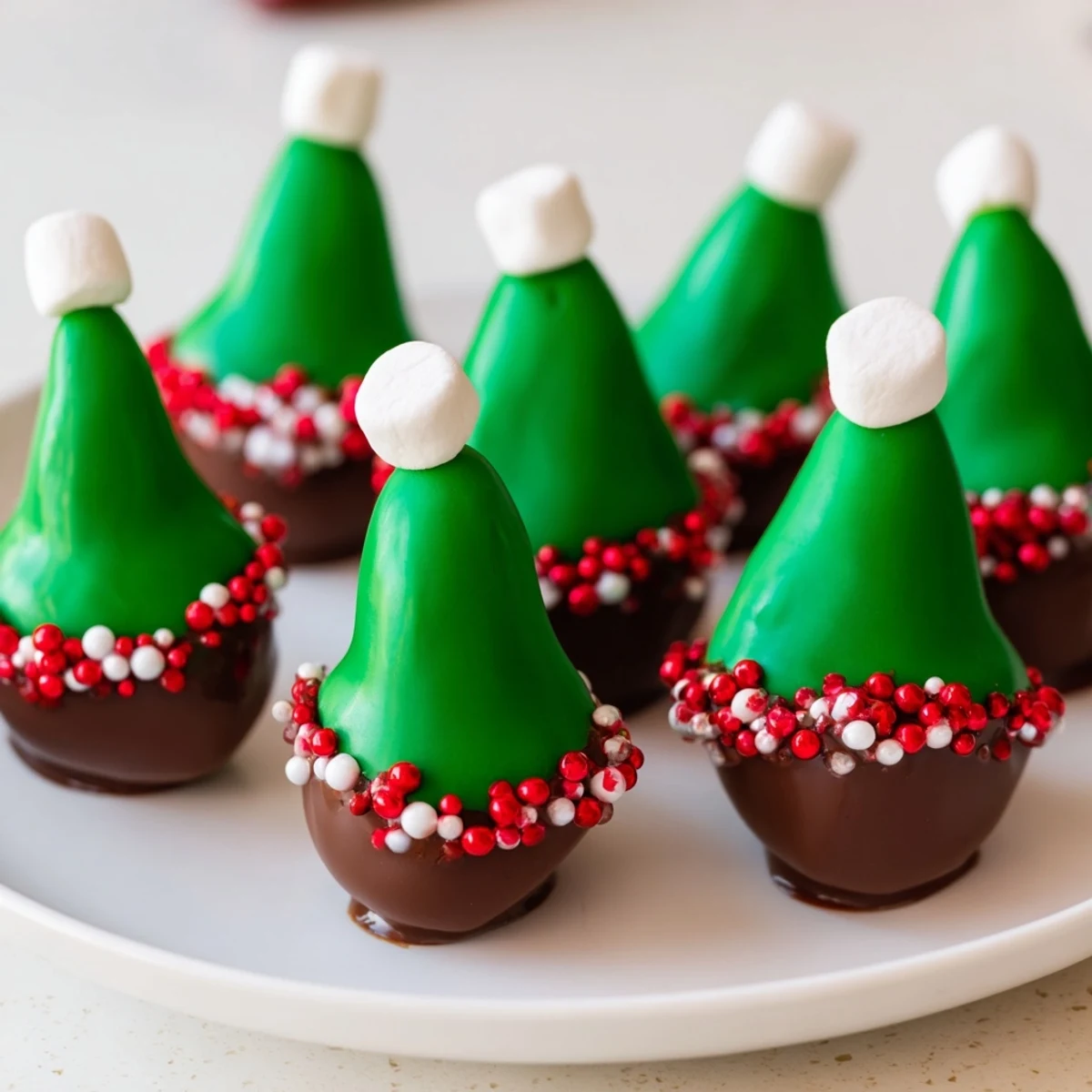 Vibrant, festive Elf Hat Chocolate Dipped Strawberries, a delightful dessert with green and white chocolate detail.