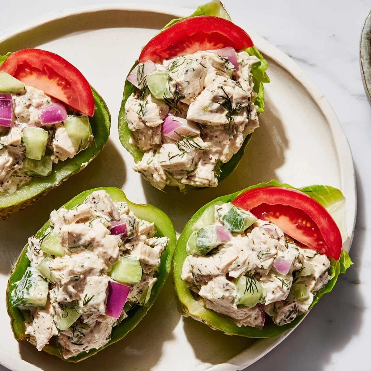 Juicy chicken salad overflows from tangy pickle halves, creating a delicious Pickle Sandwich.