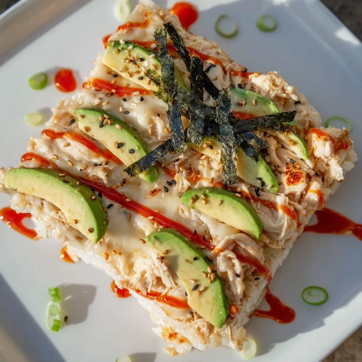 Warm, golden Chicken Sushi Bake; a flavorful casserole with creamy chicken and seasoned rice.