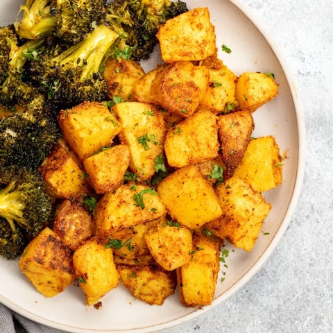 Golden, crispy Roasted Lemon Potatoes and Broccoli, a delightful side dish with smoky paprika.