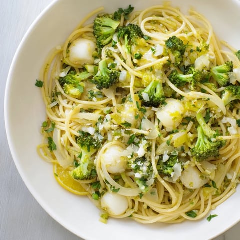 Roasted Garlic Lemon Broccoli Angel Hair Pasta with a bright lemon and Parmesan glaze.