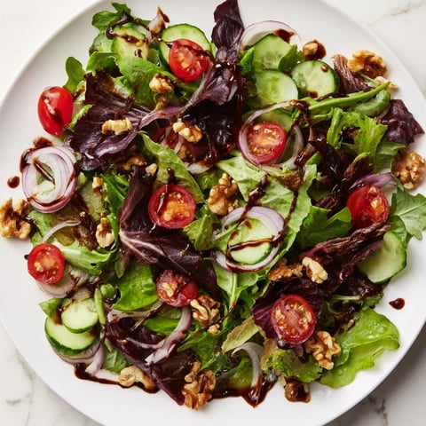 Fresh, vibrant Quick Balsamic Vinegar Salad, tossed in a tangy balsamic vinaigrette, ready to serve with a satisfying crunch.