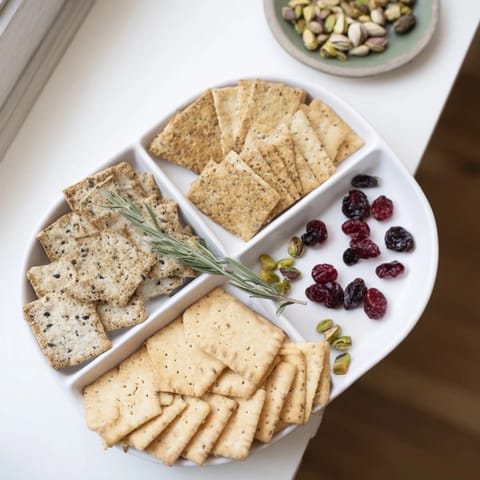 Golden-brown holiday crackers: close-up shot of assorted crackers ready for a holiday appetizer spread.
