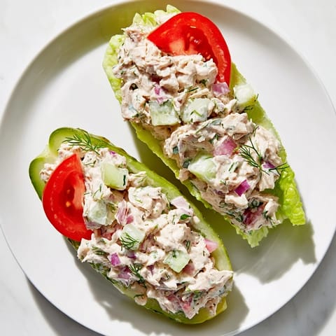 A refreshing, low-carb Pickle Sandwich: crunchy pickles filled with creamy chicken salad and veggies.